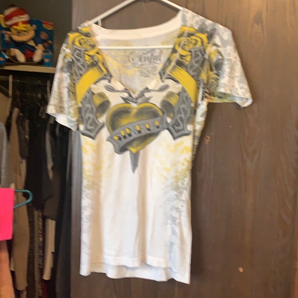 Woman’s afflictions sinful, size small white with yellow trim